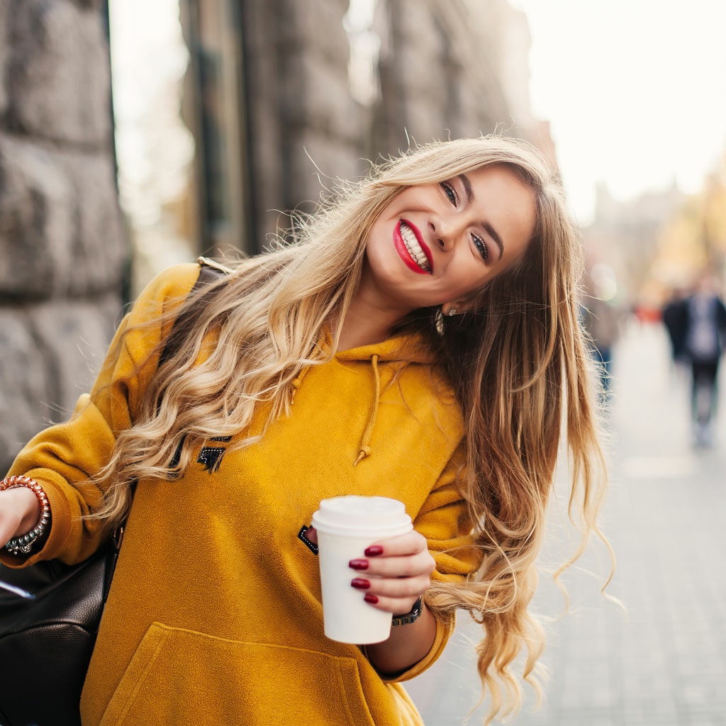 girl wearing yellow coat